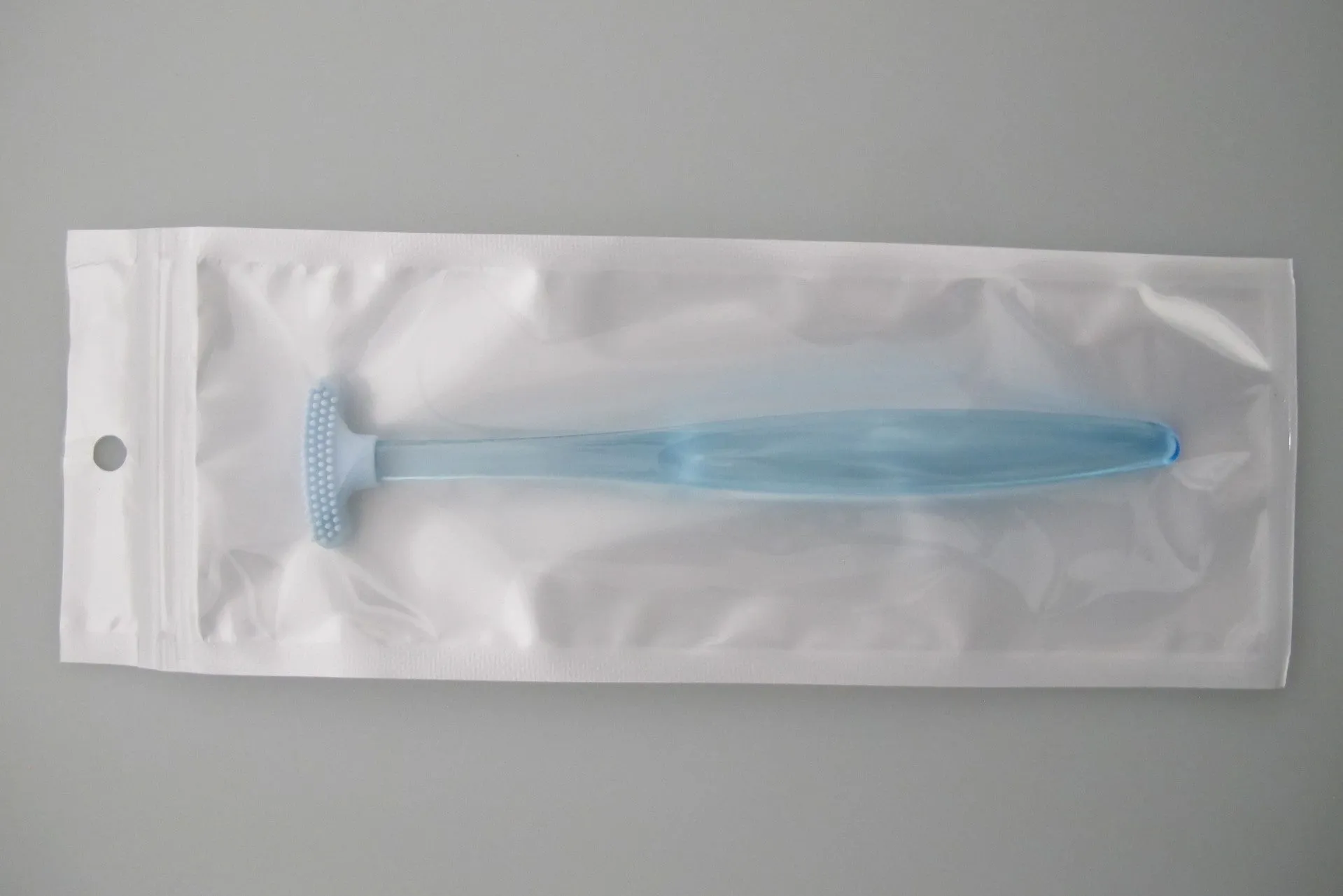 Bag tongue scraper and tongue cleaner